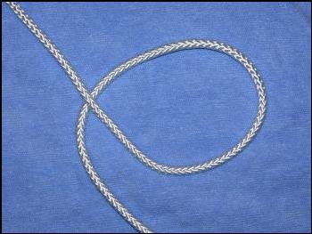 Step 2:  How to tie a 3L4B Turk's Head.  In a colockwise movement, make a loop in the cord. 